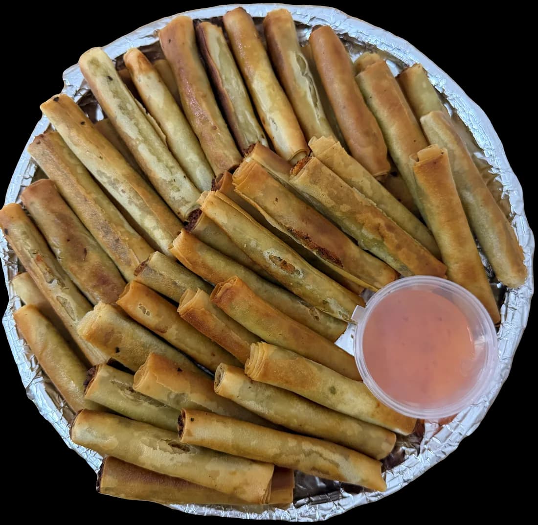 Fiesta Platter cheesy pork lumpia, crispy spring rolls with dipping sauce
